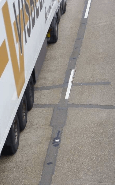 Road crack and joints repaired with Jointmaster BBA HAPAS approved system from Rhino Asphalt Solutions