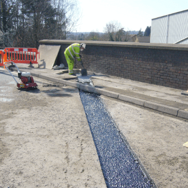 Asphaltic plug bridge expansion joint installed by Rhino Asphalt Solutions Ltd