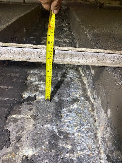 Measuring the depth of joint Asphaltic plug bridge joint APJ by Rhino Asphalt