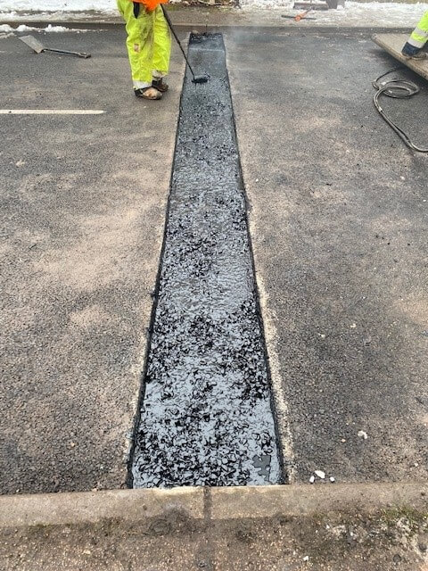 Joint tanked with binder Tanked joint Asphaltic plug bridge joint APJ by Rhino Asphalt