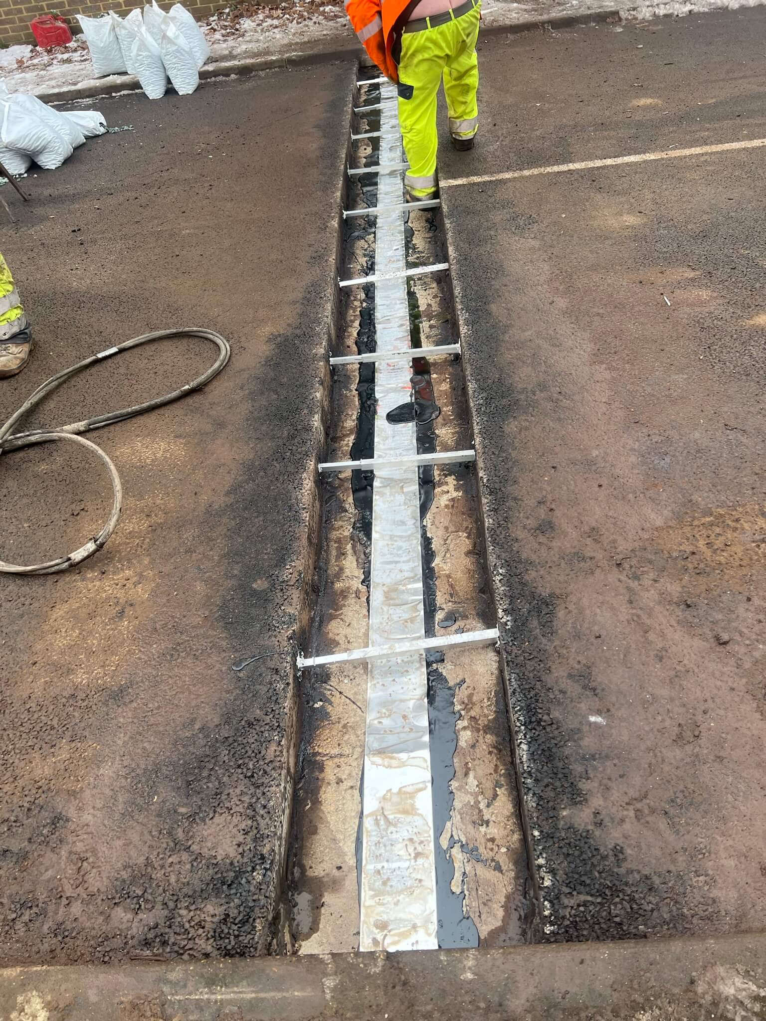 Drainage Channels Asphaltic plug bridge joint APJ by Rhino Asphalt