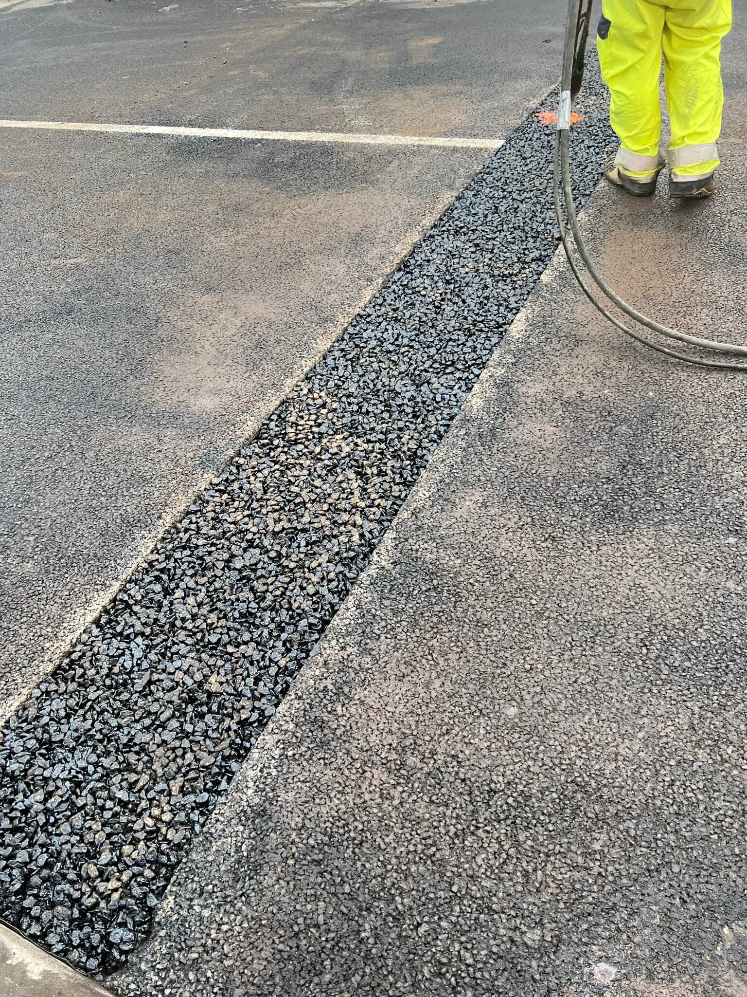 Awaiting final layer Asphaltic plug bridge joint APJ by Rhino Asphalt