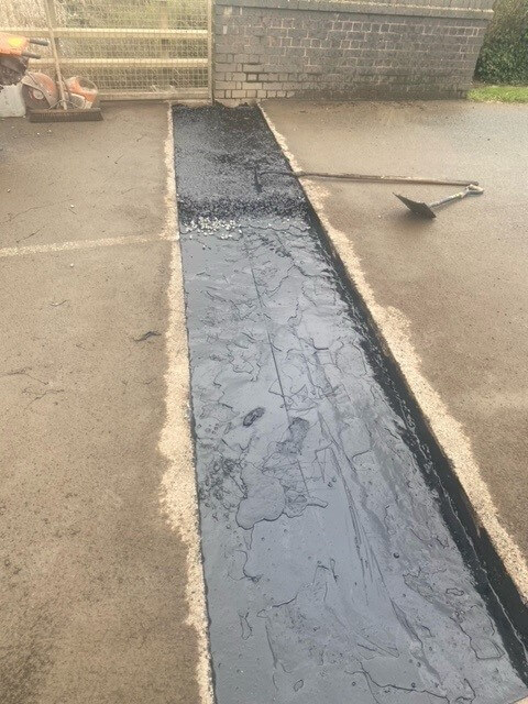 Step 2: Joint tanked with binder Tanked APJ Asphaltic plug bridge joint