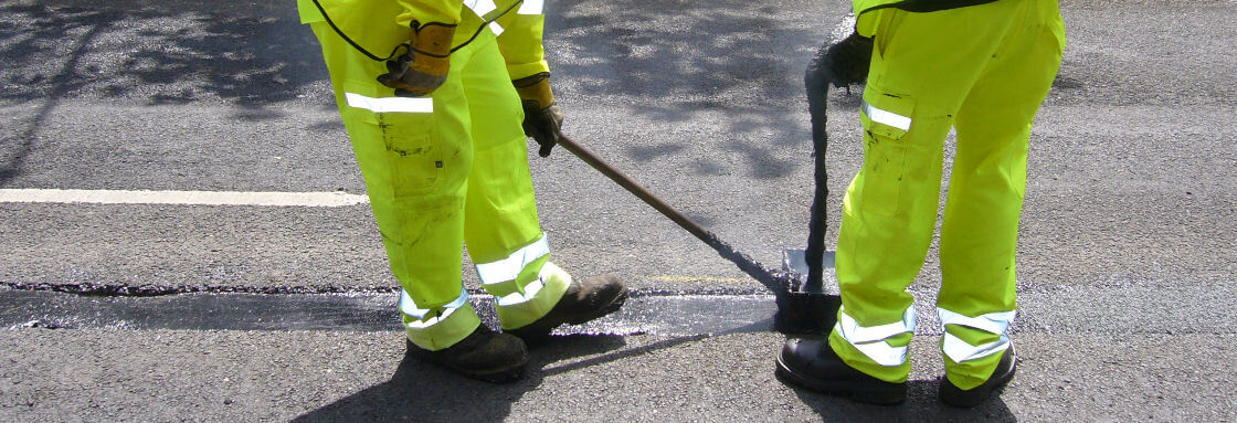 screeding and applying Road crack and joints repaired with Jointmaster BBA HAPAS approved system from Rhino Asphalt Solutions