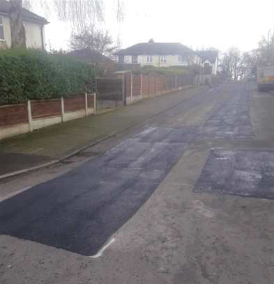 BBA HAPAS approved Masterscreed hot screed road repair system from Rhino Asphalt Solutions with BBA HAPAS approval 